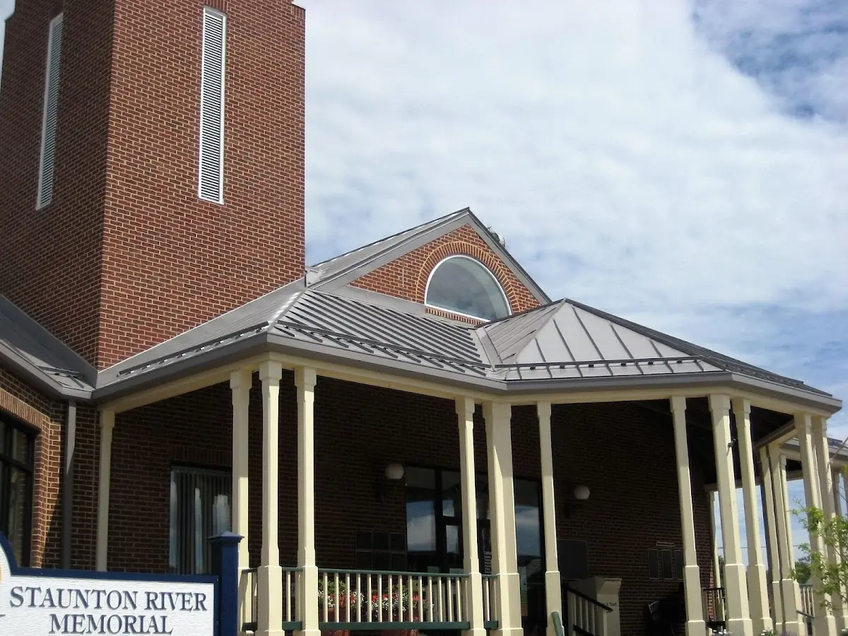 Skilled roofing craftsmen working on a residential roof in Geryville